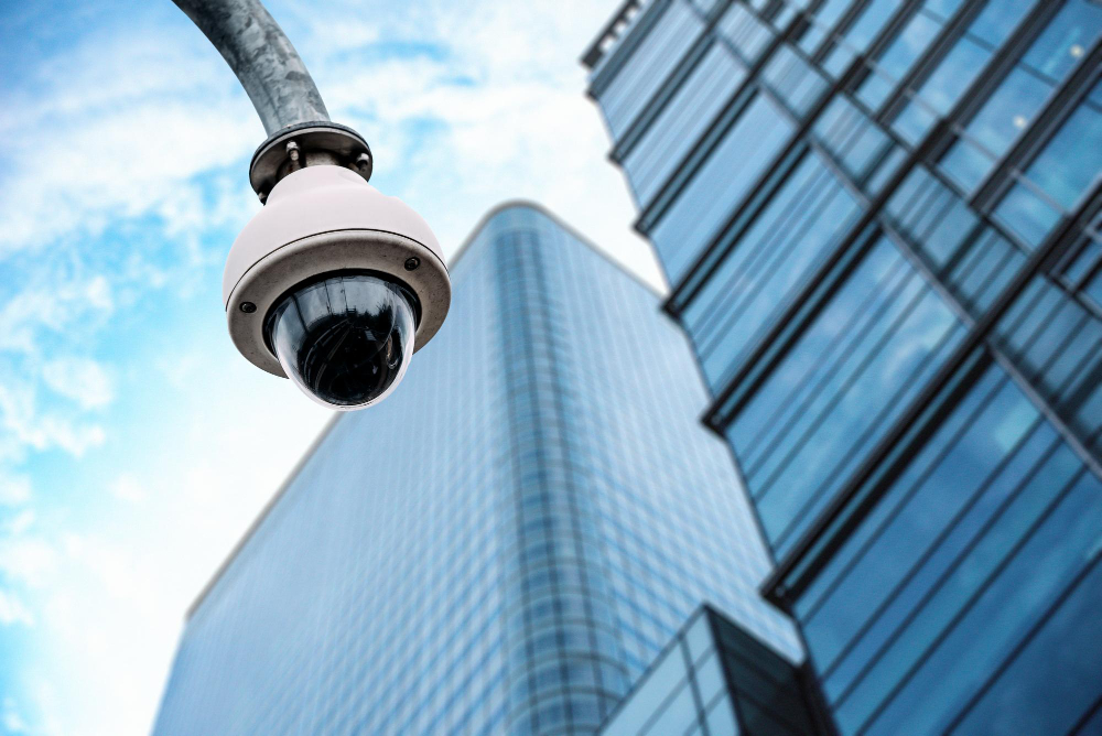 security-camera-with-glass-building-background